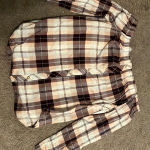 Size medium. Never worn it